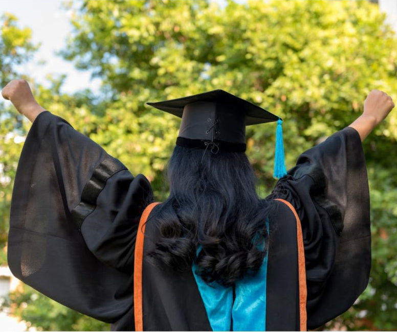 Woman wearing hair extensions for graduation