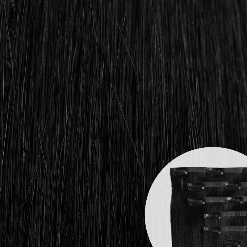 Close-up of jet black seamless clip-in hair extensions by SL Raw Virgin Hair