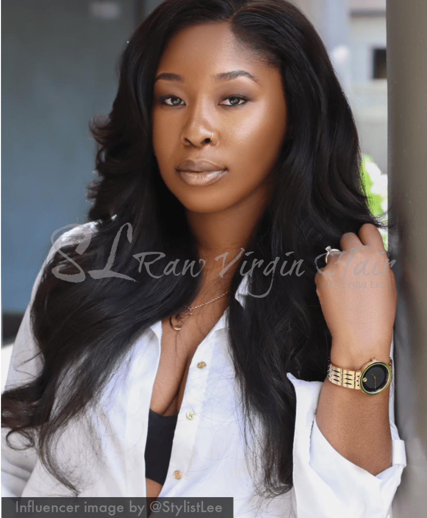 Beautiful black queen wearing exclusive hair collection from the Coarse Morocco Wavy hair bundles in 24 inch and wavy lace frontal . Beauty influencer @StylistLee