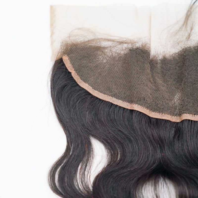 Displayed is the construction of our Malaysian Body Wave Lace frontal with baby hairs. Available at SL Raw Virgin Hair