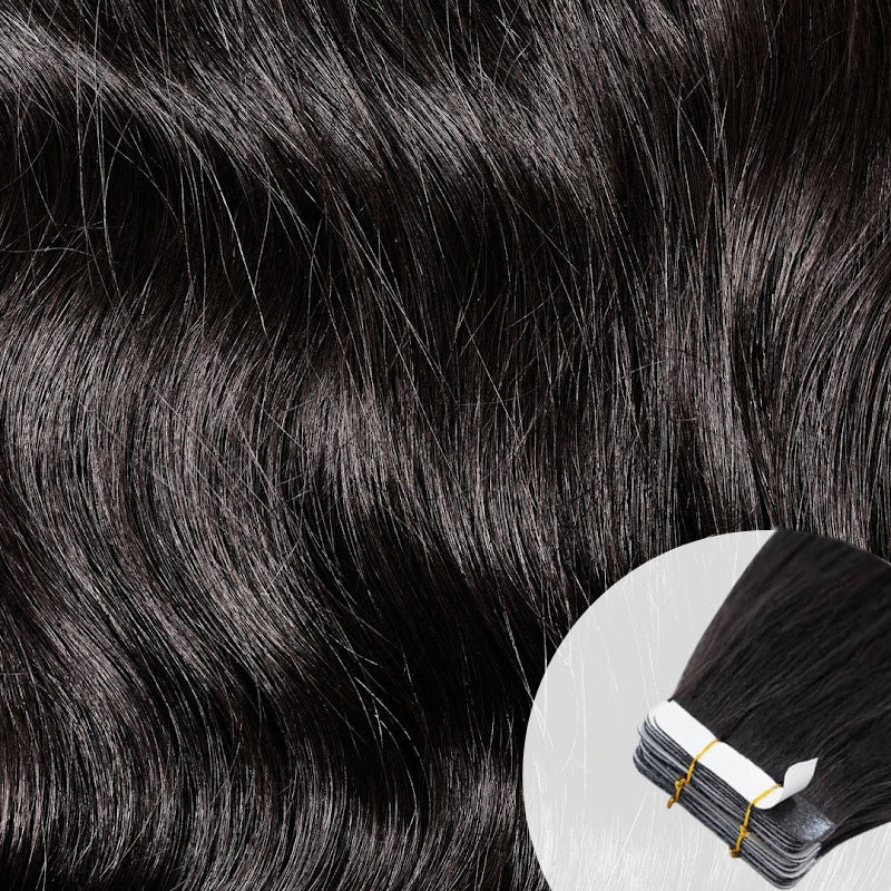 Close-up of raw virgin, wavy, natural black tape-in hair extensions by SL Raw Virgin Hair.