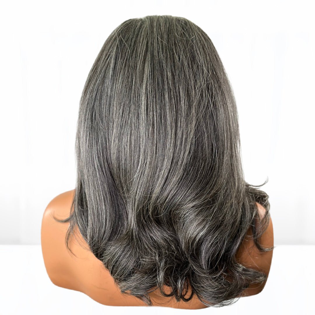 Back of Beautiful Salt and Pepper gray hair human hair lace front wig for older women with natural hair gray.
