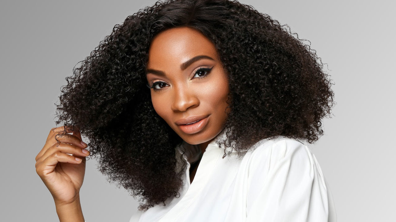 The Kinky Textured Hair Collection has textures from 2A-4C. Woman with kinky curly hair wearing hair from SL Raw Virgin Hair
