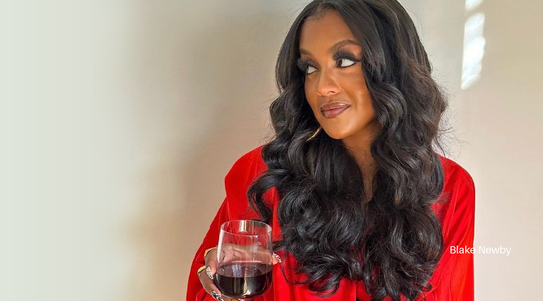 SL Raw Virgin Hair's Beautiful Hair extension Model Wearing Raw Indian Wavy Hair giving Atlanta Housewives Vibe