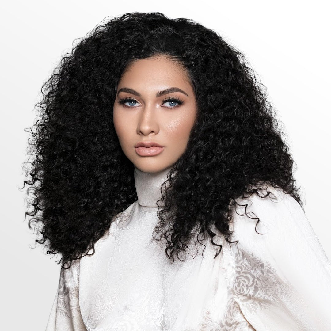 SL Raw Virgin Hair Extensions in 3A-3C curl pattern, styled on a model to showcase authentic Burmese curly texture.