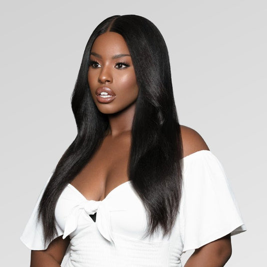 Young Black Woman wearing natural looking textured hair extension’s from SL Raw Brazilian Kinky Straight Hair. Length in 18-inches. This hair matches blow-out hair by African American women.