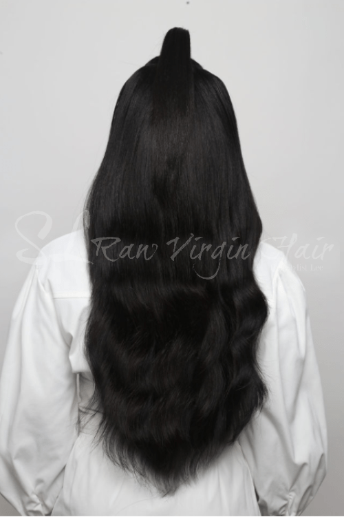 Back of the Raw natural wavy hair bundles in 20 inch by SL raw virgin hair