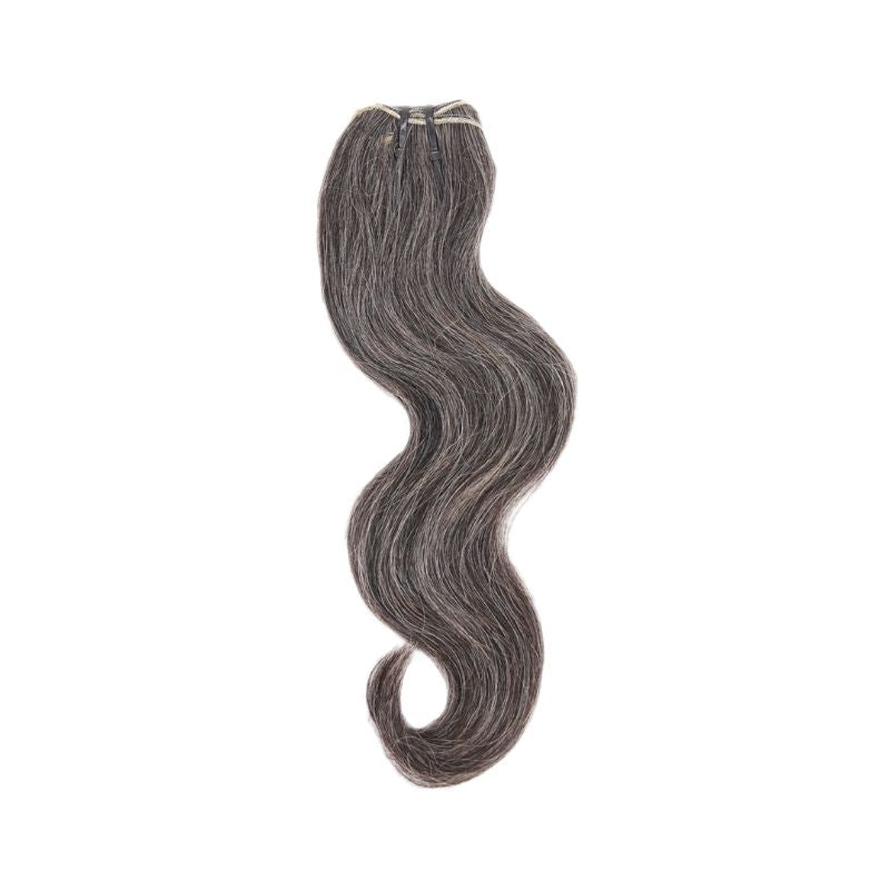 Displayed is SL Raw Virgin Hair Salt and Pepper gray hair vietnamese human hair bundles with a slight wave. beautiful hair wefts for a perfect sew in or pronto weave