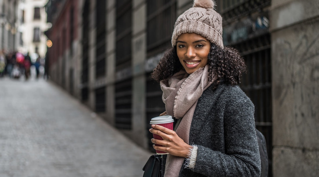 Woman in the winter city - Top Winter Hair Care Tips