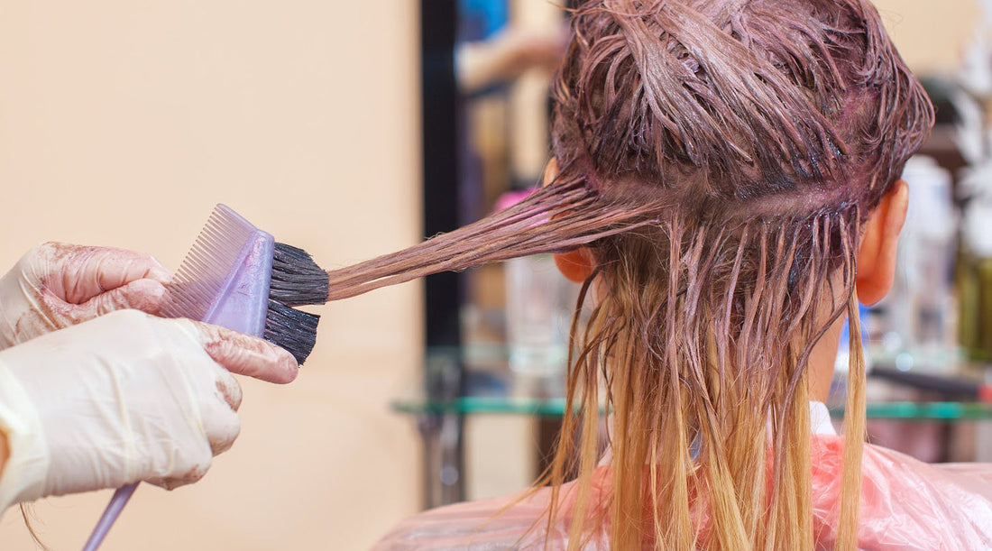 Woman getting coloring service on hair extensions - Why Coloring Your Hair Extensions Changed the Texture – And How to Prevent It