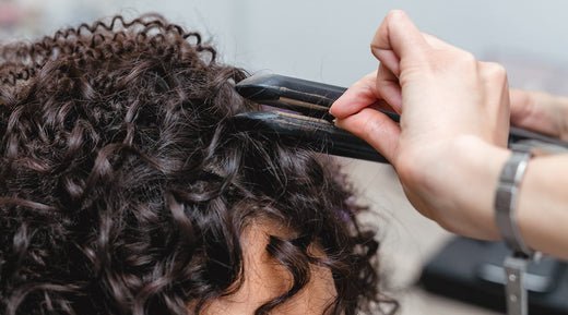 Woman showing how to Hair texture and blending extensions