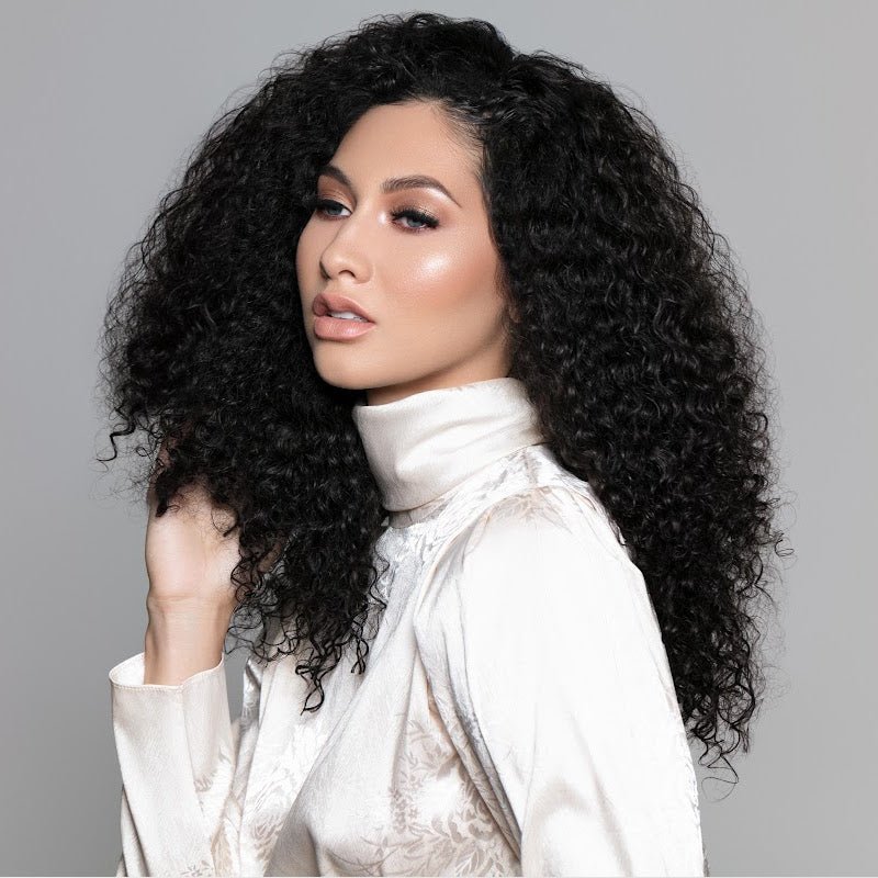 Mixed race woman wearing Raw Burmese Curly Hair 3a-3c type hair extensions - SL Raw Virgin Hair 