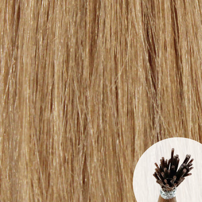 Light brown to golden brown seamless I-tip hair extensions with a circular inset showing an up-close bundle of the i-tip hair strands on a white background.