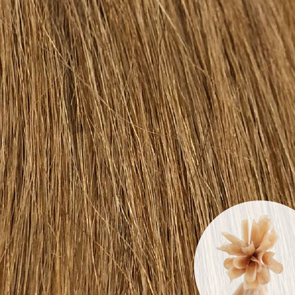 Close-up of pepper blonde light brown straight hair extensions with a small circular inset showing the K-Tip bundle attachment tip.