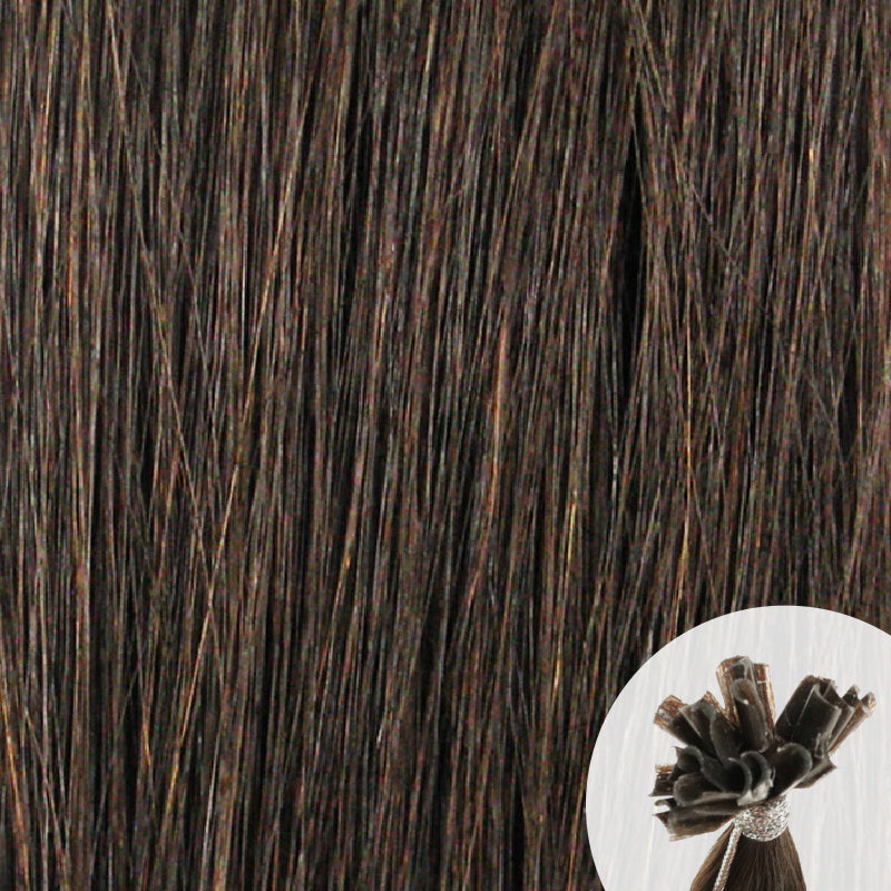 Close-up of dark brown straight hair extensions with a small circular inset showing the K-Tip bundle attachment tip.