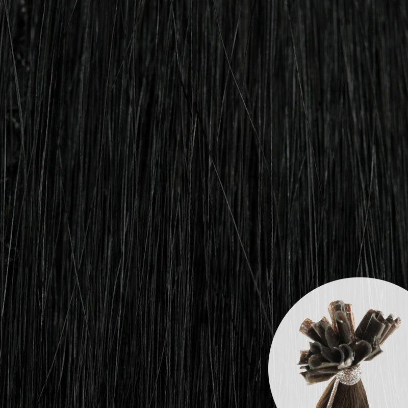 Close-up of jet black straight hair extensions with a small circular inset showing the K-Tip bundle attachment tip.