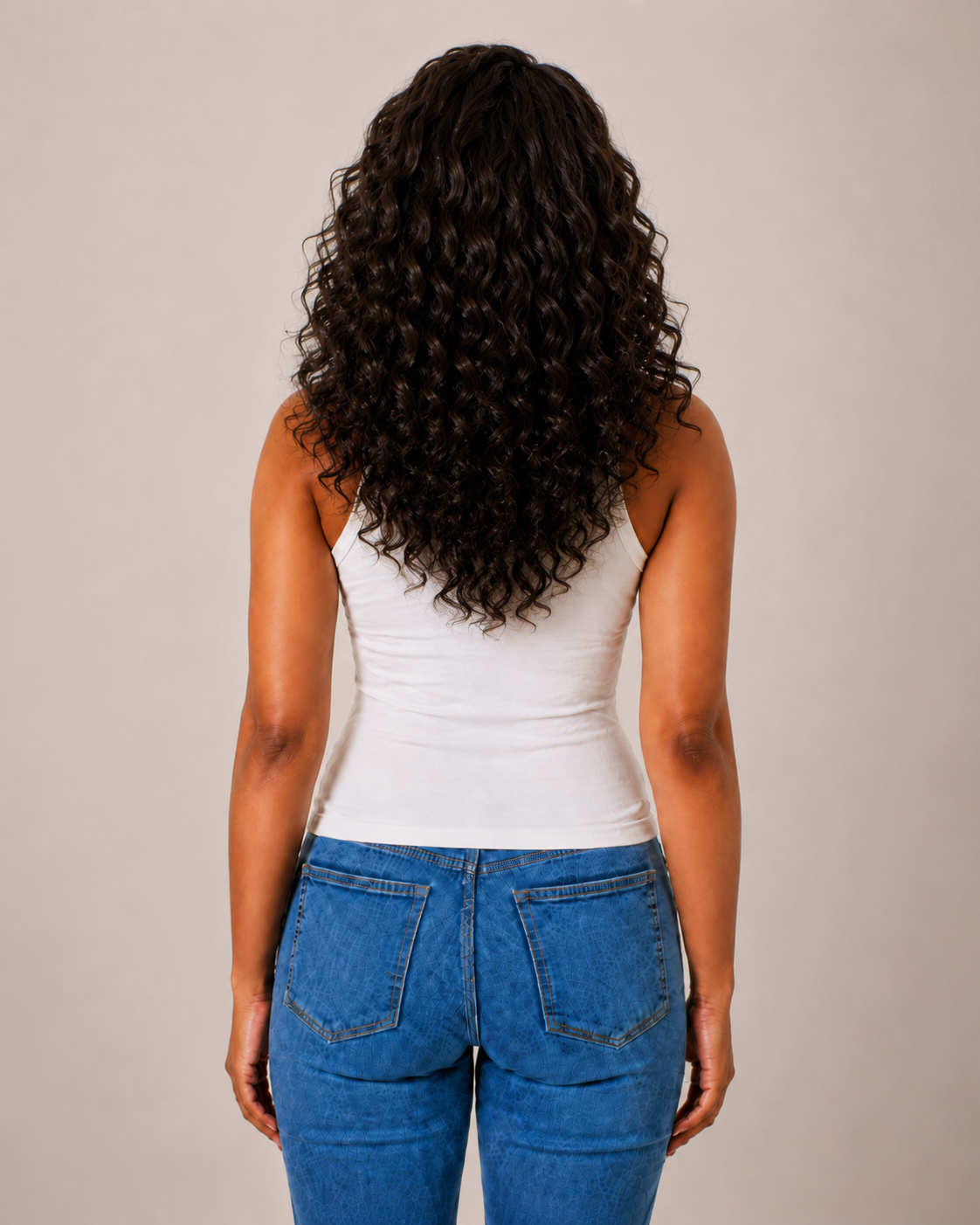 Back view illustrating the visual length of curly hair texture