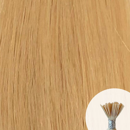 Yellow blonde seamless I-tip hair extensions with a circular inset showing an up-close bundle of the i-tip hair strands on a white background.