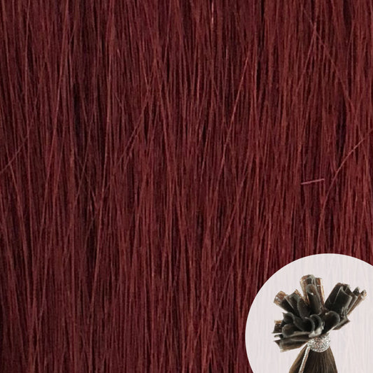 Close-up of mahogany "deep burgundy" straight hair extensions with a small circular inset showing the K-Tip bundle attachment tip.