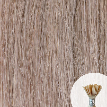 Silver Ash Blonde seamless I-tip hair extensions with a circular inset showing an up-close bundle of the i-tip hair strands on a white background.