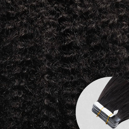 Close-up of natural black coily tape-in hair extensions  