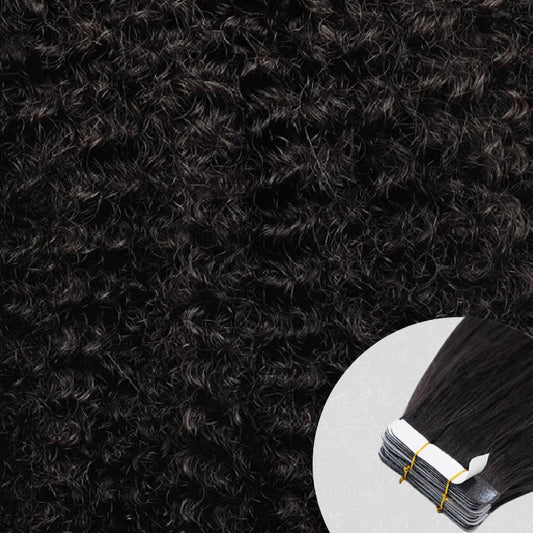Close-up of natural black coily tape-in hair extensions  