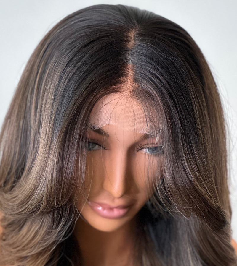 Top view of the Golden Hour Elegance Luxe Balayage Wig, showcasing its cascading layers, and seamless HD lace that blends naturally for an undetectable finish.