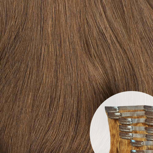 Close-up of auburn seamless clip-in hair extensions by SL Raw Virgin Hair 