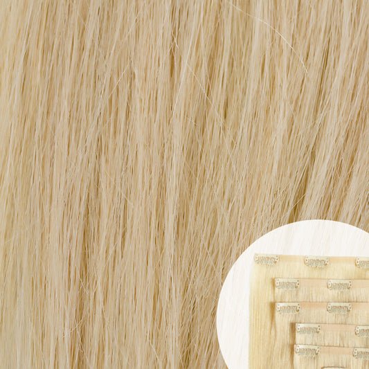Close-up of blonde seamless clip-in hair extensions by SL Raw Virgin Hair