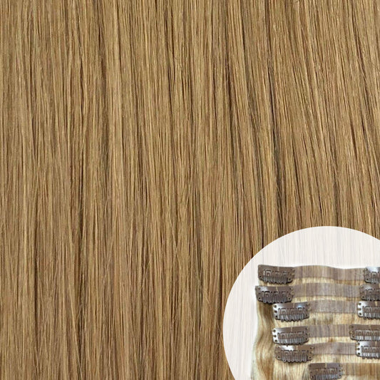 Close-up of honey blonde seamless clip-in hair extensions by SL Raw Virgin Hair