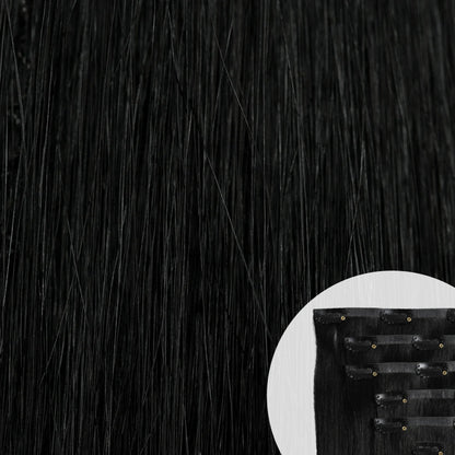 Close-up of jet black seamless clip-in hair extensions by SL Raw Virgin Hair 