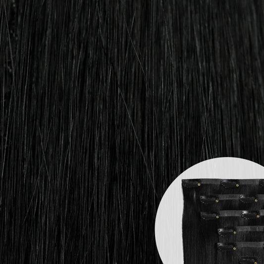 Close-up of jet black seamless clip-in hair extensions by SL Raw Virgin Hair 