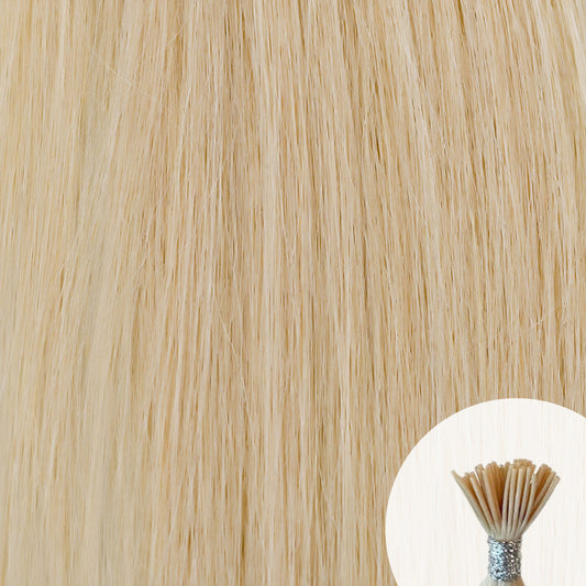 Light platinum blonde seamless I-tip hair extensions with a circular inset showing an up-close bundle of the i-tip hair strands on a white background.