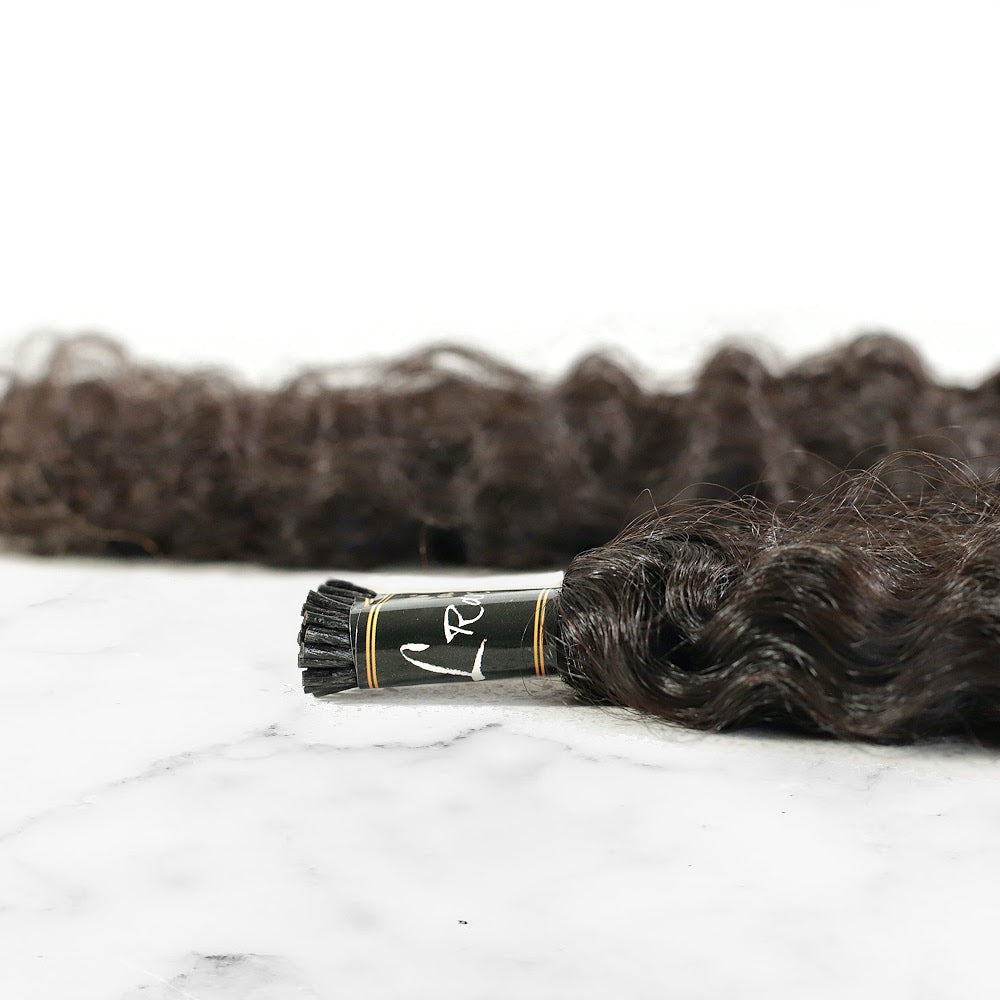 Best Selling Lao Curly I-tip Hair links (2A-2C Curl pattern)for micro links and Hot fusions sold in 50 pieces. This hair was featured in Women's Health mag and Popsugar - only available for purchase online at SL Raw Virgin Hair