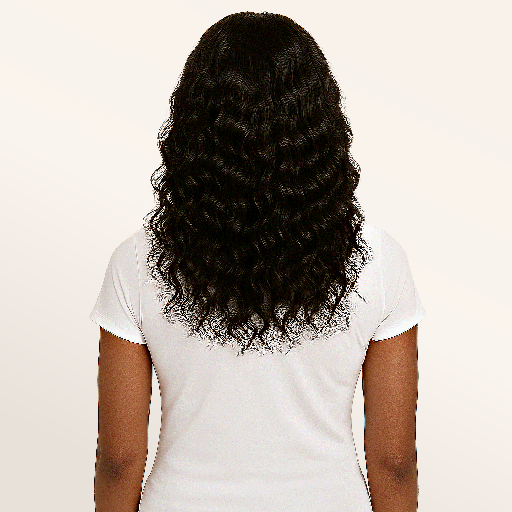 Model back view wearing raw Indian curly clip-in hair extensions by SL Raw Virgin Hair
