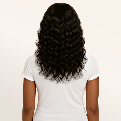 Model back view wearing raw Indian curly clip-in hair extensions by SL Raw Virgin Hair