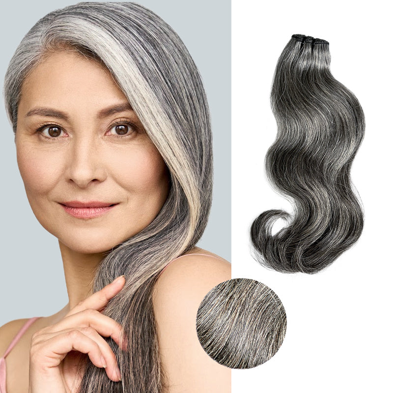 Displayed is Beautiful older woman wearing SL Raw Virgin Hair Salt and Pepper gray hair vietnamese human hair bundles with a slight wave. Hair bundle great for sew-in extensions.