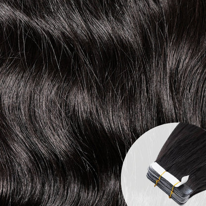 Close-up of raw virgin, wavy, natural black tape-in hair extensions by SL Raw Virgin Hair. 