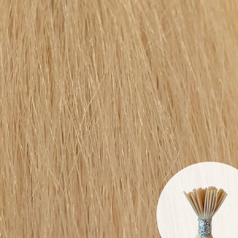 Champagne 'light blonde' seamless I-tip hair extensions with a circular inset showing an up-close bundle of the i-tip hair strands on a white background.