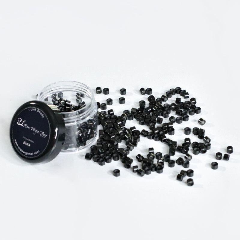 SL Raw Virgin Hair Black micro beads spilling out of a container on a white background