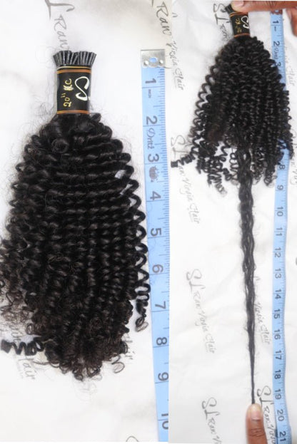 Cheveux bouclés crépus avec pointe en I