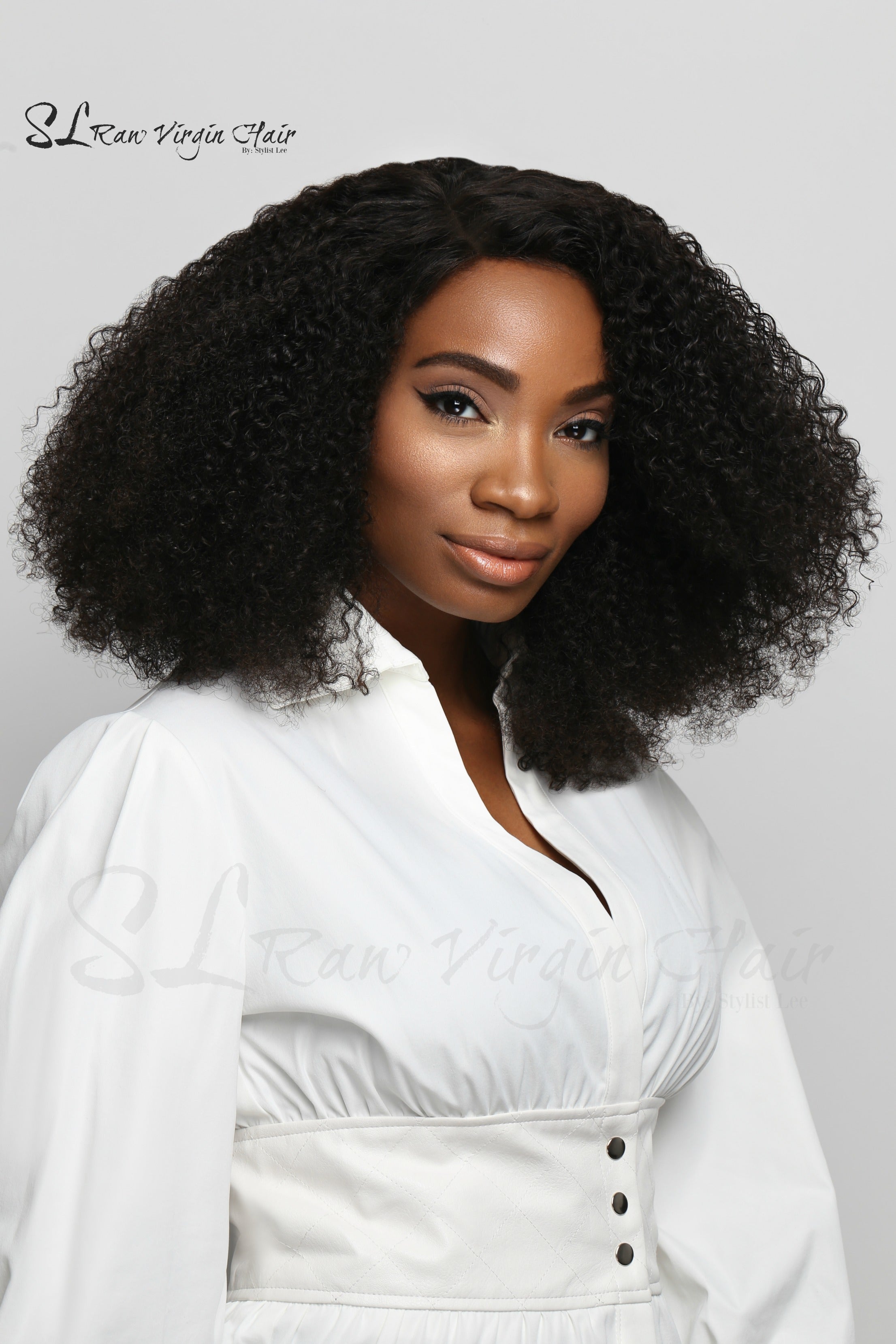 Side part Kinky Curly hair extensions on Black woman Model in 18 inches by SL Raw Virgin Hair Company