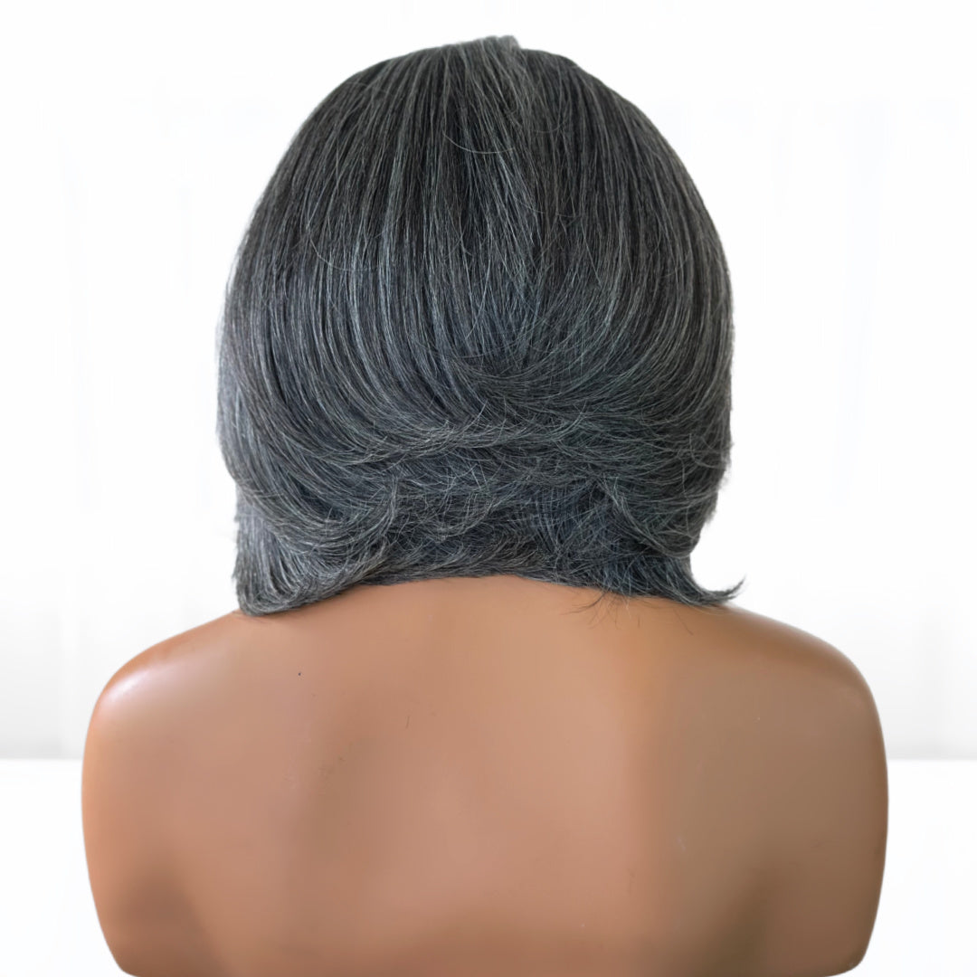 Layered back of Beautiful Natural gray salt and pepper Fit 'N' Go Short Bob wig for mature women. Thick and fully made of Southeast asian human hair. Crafted with precision cutting layers