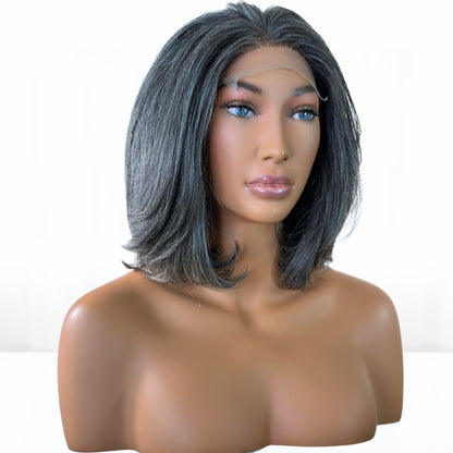 Front view of Beautiful Natural looking gray hair salt and pepper Fit 'N' Go Wig in 12-inches. Bob style Cut into Razor Short Layers for mature women. Thick and fully made of Raw Vietnamese human hair. For medium head sizes 22inch circumference. Crafted with precision cutting layers for a feather look