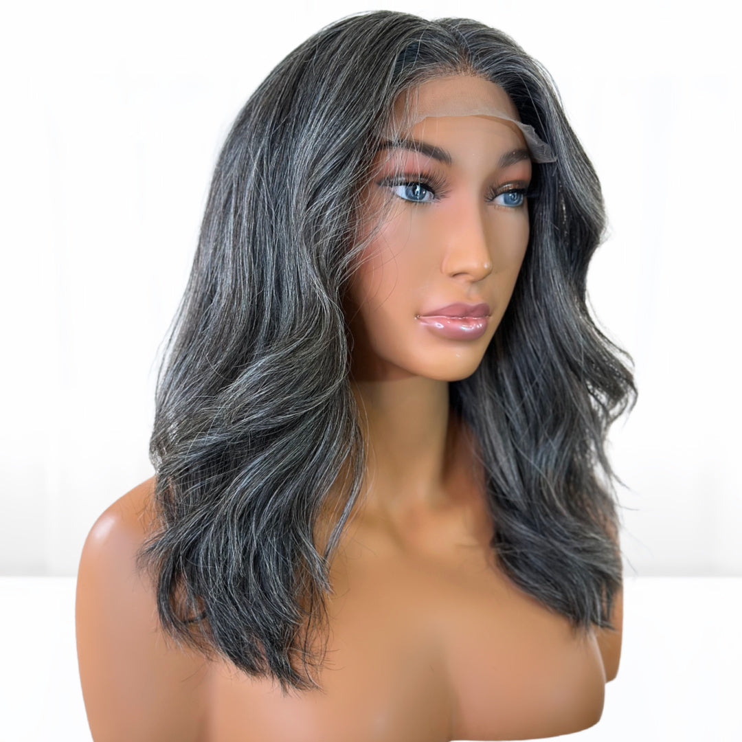 Glue-less wig. Beautiful Natural looking gray hair salt and pepper Fit 'N' Go Wig in 14-inches. Cut into Long Layers for mature women. Thick and fully made of Raw Vietnamese human hair. For medium head sizes 22inch circumference. Crafted with precision cutting layers for a tussle finish