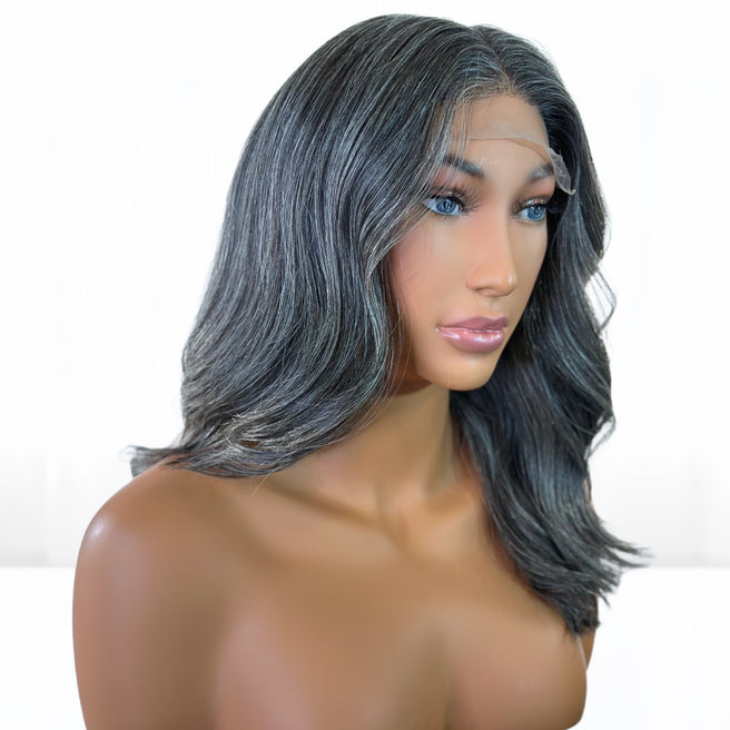 Beautiful Natural gray salt and pepper Fit 'N' Go Short Long Layered wig for mature women. Thick and fully made of Southeast asian human hair. Crafted with precision cutting layers for a tussle finish