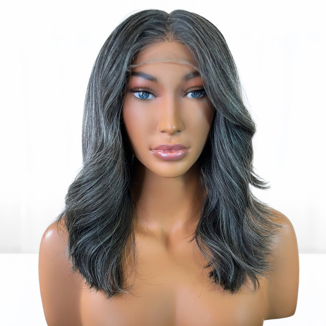Front view of Beautiful Natural looking gray hair salt and pepper Fit 'N' Go Wig in 14-inches. Cut into Long Layers for mature women. Thick and fully made of Raw Vietnamese human hair. For medium head sizes 22inch circumference. Crafted with precision cutting layers for a tussle finish