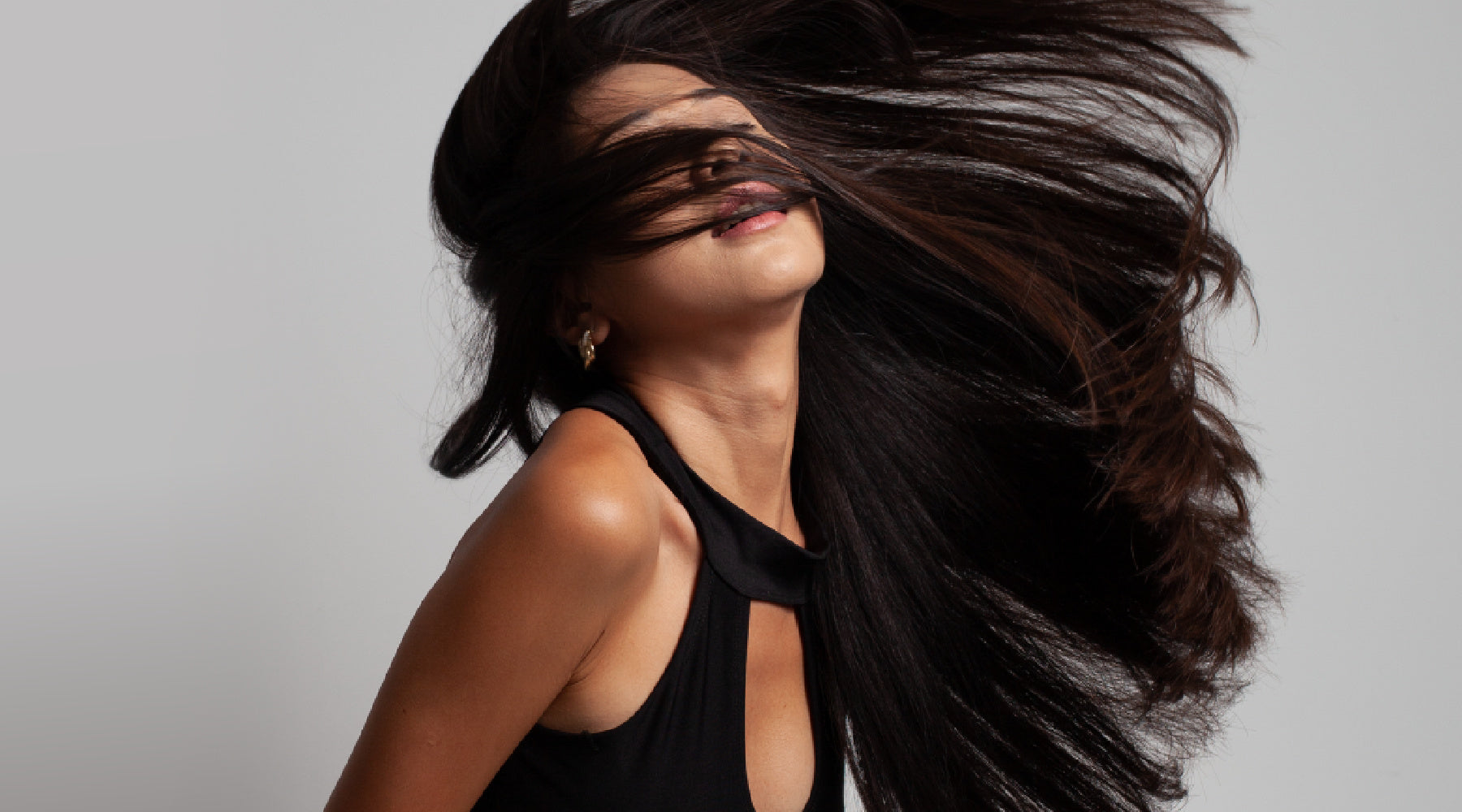 SL Raw Virgin Hair Model Tossing Her Natural-flowing Organic K-Tip Hair Extensions Back 