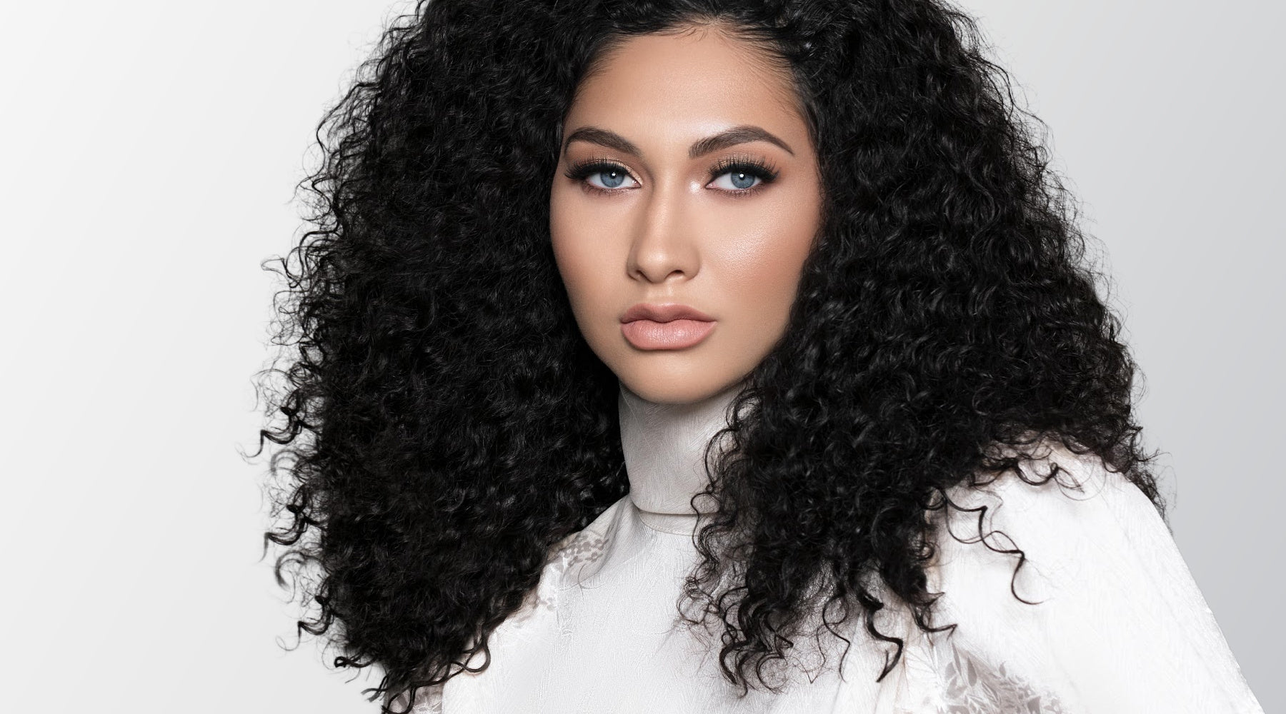 Beautifully styled Burmese Curly 3A Hair Extensionby SL Raw Virgin Hair - Wigs, Wefts, and I-tips 