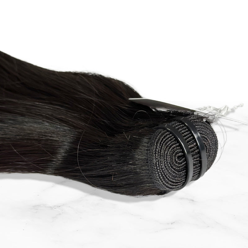 Up close shot of SL raw Virgin Hair "Vietnamese Straight" Raw Weft Hair extensions in a beautiful Natural Black. Great for sew-in  
